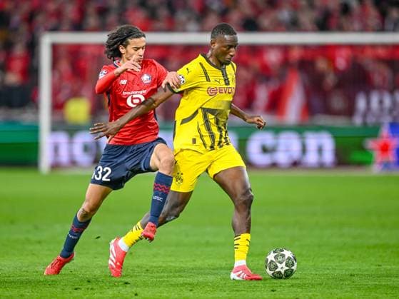 Lille, France, 12 03 2025 Ayyoub Bouaddi LOSC Lille and Serhou Guirassy BV Borussia Dortmund battle for the ball during the UEFA Champions League 2024 25 Round of 16 Second Leg match between LOSC Lille and Borussia Dortmund at Stade Pierre Mauroy on March 12, 2025 in Lille, France Photo by Harry Langer DeFodi Images