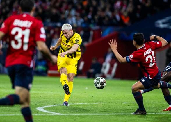 Lille, Stade Pierre Mauroy, 12 03 2025 Julian Ryerson of Dortmund kicks the ball during the match of the Championsleague Round 16 between Lille OSC v Borussia Dortmund