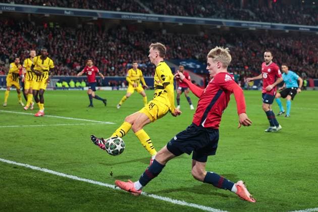 12 03 2025, UEFA Champions League, round of 16, Lille OSC Borussia Dortmund, f l Maximilian Beier Borussia Dortmund , Hakon Arnar Haraldsson LOSC Lille , Lille Stade Pierre Mauroy Decathlon Arena Paris xRHR PHOTO DEx Copyright: DennisxEwert RHR-FOTOx RHR-FOTO DE