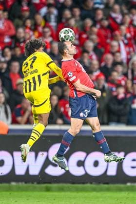 Lille, France, 12 03 2025 Karim Adeyemi BV Borussia Dortmund and Ismaily LOSC Lille battle for the ball during the UEFA Champions League 2024 25 Round of 16 Second Leg match between LOSC Lille and Borussia Dortmund at Stade Pierre Mauroy on March 12, 2025 in Lille, France Photo by Harry Langer DeFodi Images