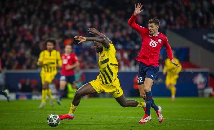Lille, Germany 12th Mar 2025 Serhou Guirassy BvB Thomas Meunier Lille OSC Lille Borussia Dortmund 12 03 2025