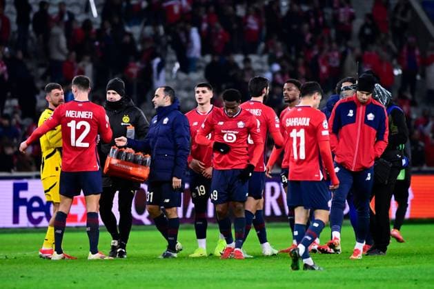 FOOTBALL : Lille vs Borussia Dortmund - Ligue des Champions - 12 03 2025 Lille players look dejected following UEFA Champions League match between Lille OSC and Borussia Dortmund at Stade Pierre Mauroy on March 12, 2025 in Lille, France. ( Photo by Dante Badano PsnewZ ) - LilleFrance  Copyright: xDantexBadanox
