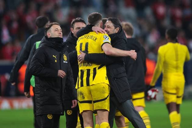 12 03 2025, UEFA Champions League, round of 16, Lille OSC Borussia Dortmund, f l standard Coach Alex Clapham Borussia Dortmund , Co Coach Robert Kovac Borussia Dortmund , Nico Schlotterbeck Borussia Dortmund , Coach Niko Kovac Borussia Dortmund hugging each other, Lille Stade Pierre Mauroy Decathlon Arena Paris xRHR PHOTO DEx Copyright: DennisxEwert RHR-FOTOx RHR-FOTO DE