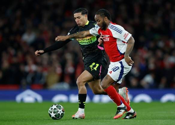 Arsenal FC v PSV Eindhoven - UEFA Champions League 2024 25 Round of 16 Second Leg Couhaib Driouech of PSV Eindhoven and Raheem Sterling of Arsenal challenge during the UEFA Champions League 2024 25 UEFA Champions League 2024 25 Round of 16 Second Leg match between Arsenal FC and PSV at Emirates Stadium on March 12, 2025 in London, England. London Emirates Stadium England United Kingdom Copyright: xNigelxFrench Sportsphoto APLx 14061009