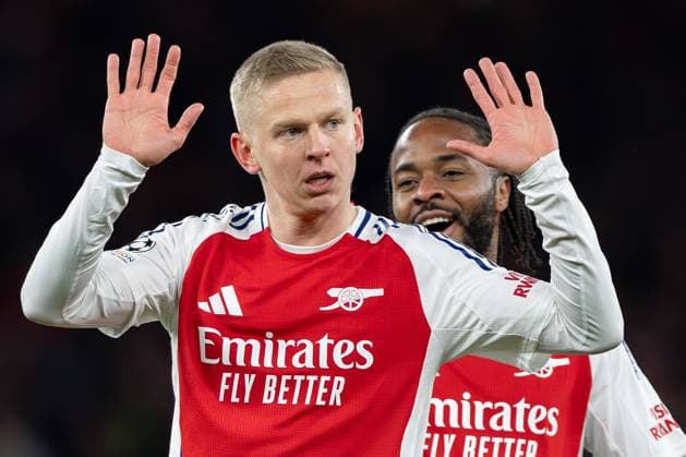 12th March 2025; Emirates Stadium, London, England; UEFA Champions League Last 16, Second Leg Football, Arsenal versus PSV Eindhoven; Oleksandr Zinchenko of Arsenal scores Arsenal& x2019;s first goal and celebrates apologetically  ActionPlus12759338 IanxStephen