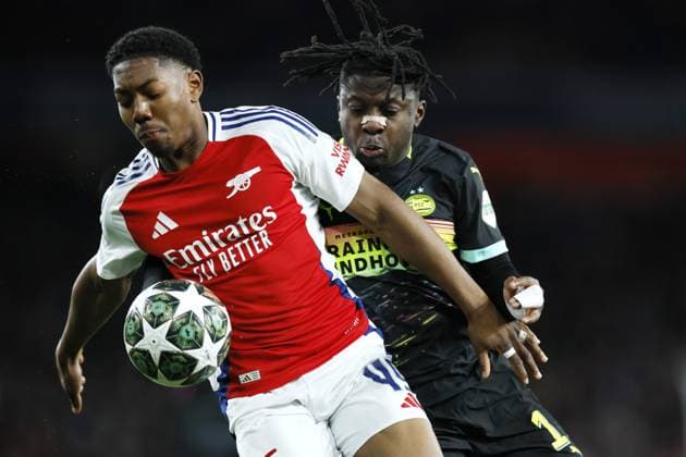 LONDON - (l-r) Myles Lewis-Skelly of Arsenal FC, Johan Bakayoko of PSV Eindhoven during the UEFA Champions league match between Arsenal FC and PSV Eindhoven at Emirates Stadium on March 12, 2025 in London, England. ANP KOEN VAN WEEL UEFA Champions League 2024 25 Round of 16 Second Leg 2024 25 xVIxANPxSportx xxANPxIVx 522214980 originalFilename: 522214980.jpg