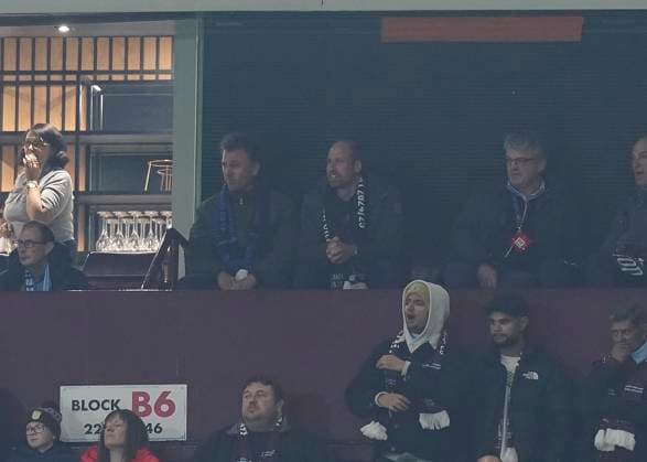 Birmingham, England, 12th March 2025. HRH Prince William is seen watching from the stands during the UEFA Champions League match Aston Villa v Club Brugge at Villa Park, Birmingham. Picture credit should read: Andrew Yates Sportimage EDITORIAL USE ONLY. No use with unauthorised audio, video, data, fixture lists, club league logos or live services. Online in-match use limited to 120 images, no video emulation. No use in betting, games or single club league player publications. SPI_022_AY_Villa_Brugge SPI-3740-0022