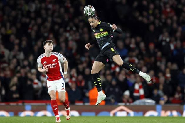 LONDON - (l-r) Kieran Tierney of Arsenal FC, Armando Obispo of PSV Eindhoven during the UEFA Champions league match between Arsenal FC and PSV Eindhoven at Emirates Stadium on March 12, 2025 in London, England. ANP KOEN VAN WEEL UEFA Champions League 2024 25 Round of 16 Second Leg 2024 25 xVIxANPxSportx xxANPxIVx 522215324 originalFilename: 522215324.jpg