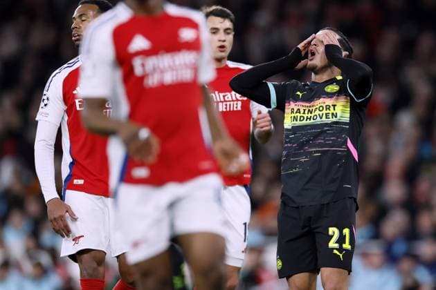LONDON - Couhaib Driouech of PSV Eindhoven balks during the UEFA Champions league match between Arsenal FC and PSV Eindhoven at Emirates Stadium on March 12, 2025 in London, England. ANP KOEN VAN WEEL UEFA Champions League 2024 25 Round of 16 Second Leg 2024 25 xVIxANPxSportx xxANPxIVx 522215471 originalFilename: 522215471.jpg