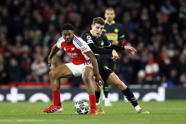 LONDON - (l-r) Myles Lewis-Skelly of Arsenal FC, Guus Til of PSV Eindhoven during the UEFA Champions league match between Arsenal FC and PSV Eindhoven at Emirates Stadium on March 12, 2025 in London, England. ANP KOEN VAN WEEL UEFA Champions League 2024 25 Round of 16 Second Leg 2024 25 xVIxANPxSportx xxANPxIVx 522215803 originalFilename: 522215803.jpg