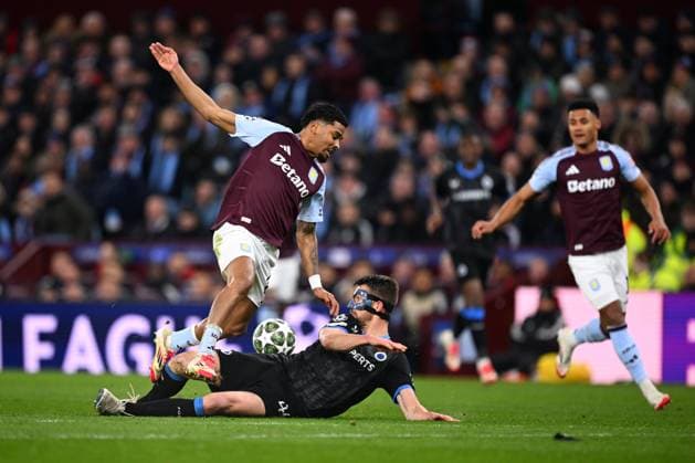Aston Villa v Club Brugge - UEFA Champions League BIRMINGHAM, ENGLAND - MARCH 12 : Maatsen Ian defender of Aston Villa and Mechele Brandon defender of Club Brugge in action during the UEFA Champions League 2024 25 round of 16 match second leg between Aston Villa and Club Brugge on March 12, 2025 in Birmingham, England, 12 03 2025 Birmingham England  Copyright: xTomasxSiskx