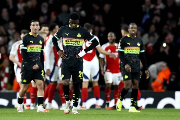 LONDON - (l-r) Couhaib Driouech of PSV Eindhoven, Isaac Babadi of PSV Eindhoven, Tyrell Malacia of PSV EIndhoven disappointment after the 2-1 during the UEFA Champions league match between Arsenal FC and PSV Eindhoven at Emirates Stadium on March 12, 2025 in London, England. ANP KOEN VAN WEEL UEFA Champions League 2024 25 Round of 16 Second Leg 2024 25 xVIxANPxSportx xxANPxIVx 522216857 originalFilename: 522216857.jpg