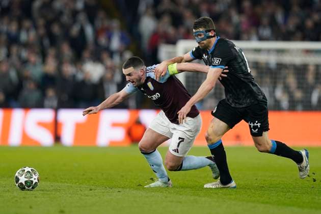 Birmingham, England, 12th March 2025. John McGinn of Aston Villa and Brandon Mechele of Club Brugge challenge for the ball during the UEFA Champions League match Aston Villa v Club Brugge at Villa Park, Birmingham. Picture credit should read: Andrew Yates Sportimage EDITORIAL USE ONLY. No use with unauthorised audio, video, data, fixture lists, club league logos or live services. Online in-match use limited to 120 images, no video emulation. No use in betting, games or single club league player publications. SPI_033_AY_Villa_Brugge SPI-3740-0033