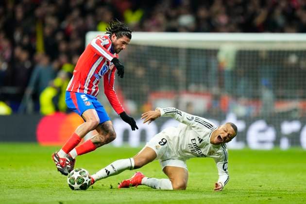 Atletico de Madrid v Real Madrid C.F. - UEFA Champions League 2024 25 Round of 16 Second Leg Kylian Mbappe centre-forward of Real Madrid and France and Rodrigo de Paul central midfield of Atletico de Madrid and Argentina compete for the ball during the UEFA Champions League 2024 25 UEFA Champions League 2024 25 Round of 16 second leg match between Atletico de Madrid and Real Madrid C.F. at Estadio Riyadh Air Metropolitano on March 12, 2025 in Madrid, Spain. Madrid Spain  Copyright: xJosexBretonx originalFilename:bretonhernandez-atletico250312_npAEb.jpg
