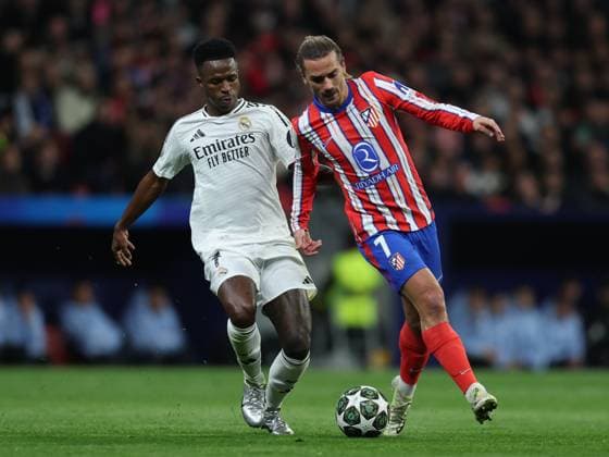 ESP: Atletico de Madrid - Real Madrid. UEFA Champions League match. Round of 16. Second Leg. Antoine Griezmann of Atletico de Madrid and Vinicius Junior of Real Madrid during the UEFA Champions League match, Round of 16, second leg, between Atletico de Madrid and Real Madrid played at Riyadh Air Metropolitano Stadium on March 12, 2025 in Madrid Spain. kpng Copyright: xAntonioxPozox xPRESSINPHOTOx AP_250312_ATL_RMA_UCL_036