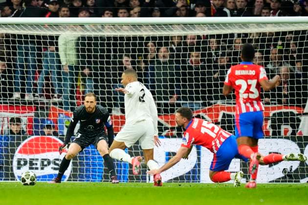 Atletico de Madrid v Real Madrid C.F. - UEFA Champions League 2024 25 Round of 16 Second Leg Kylian Mbappe centre-forward of Real Madrid and France and Clement Lenglet centre-back of Atletico de Madrid and France compete for the ball during the UEFA Champions League 2024 25 UEFA Champions League 2024 25 Round of 16 second leg match between Atletico de Madrid and Real Madrid C.F. at Estadio Riyadh Air Metropolitano on March 12, 2025 in Madrid, Spain. Madrid Spain  Copyright: xJosexBretonx originalFilename:bretonhernandez-atletico250312_npIXa.jpg