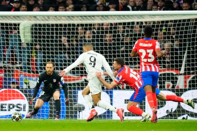 Atletico de Madrid v Real Madrid C.F. - UEFA Champions League 2024 25 Round of 16 Second Leg Kylian Mbappe centre-forward of Real Madrid and France and Clement Lenglet centre-back of Atletico de Madrid and France compete for the ball during the UEFA Champions League 2024 25 UEFA Champions League 2024 25 Round of 16 second leg match between Atletico de Madrid and Real Madrid C.F. at Estadio Riyadh Air Metropolitano on March 12, 2025 in Madrid, Spain. Madrid Spain  Copyright: xJosexBretonx originalFilename:bretonhernandez-atletico250312_npv5H.jpg