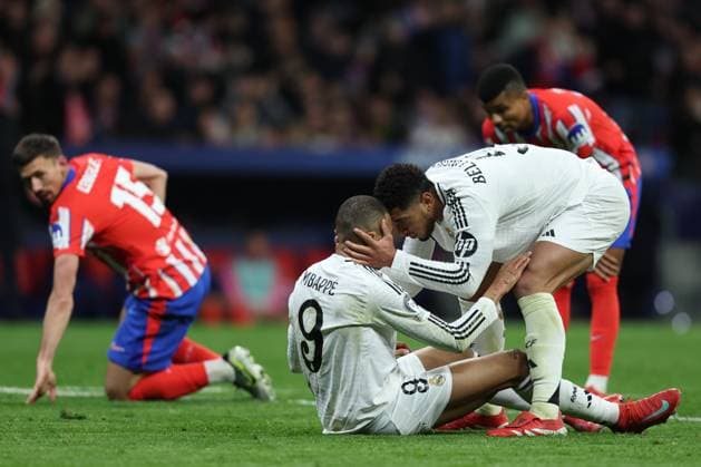 ESP: Atletico de Madrid - Real Madrid. UEFA Champions League match. Round of 16. Second Leg. Kylian Mbappe and Jude Bellingham of Real Madrid during the UEFA Champions League match, Round of 16, second leg, between Atletico de Madrid and Real Madrid played at Riyadh Air Metropolitano Stadium on March 12, 2025 in Madrid Spain. kpng Copyright: xAntonioxPozox xPRESSINPHOTOx AP_250312_ATL_RMA_UCL_061