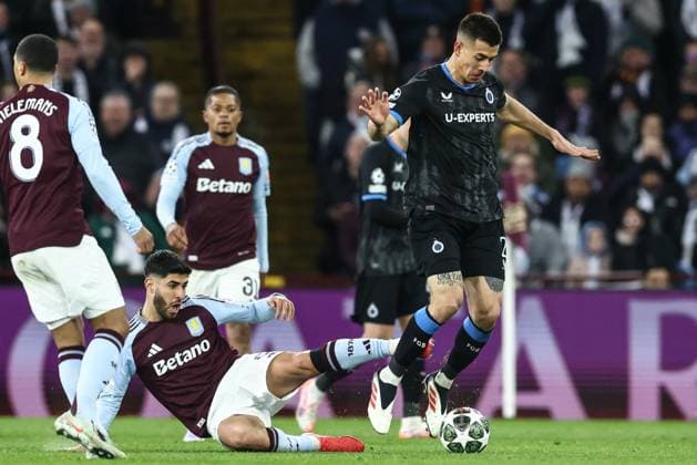 Aston Villa s Marco Asensio and Club s Zaid Romero fight for the ball during a game between English club Aston Villa and Belgian soccer Club Brugge KV, Wednesday 12 March 2025 in Birmingham, United Kingdom, the second leg of the 1 8 finals of the UEFA Champions League knockout phase. BRUNOxFAHY  x114819501x