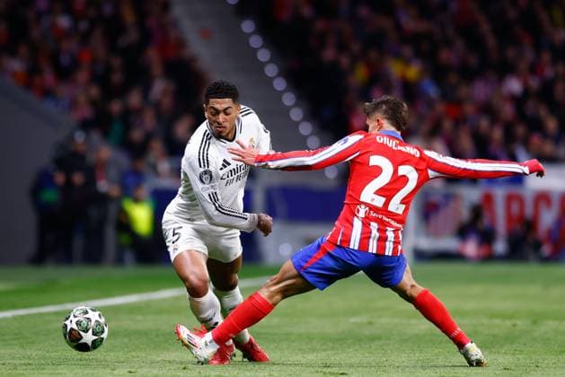March 12, 2025, Madrid, Madrid, SPAIN: Jude Bellingham of Real Madrid and Giuliano Simeone of Atletico de Madrid in action during the UEFA Champions League 2024 25 League Round of 16 Second Leg match between Atletico de Madrid and Real Madrid CF, at Riyadh Air Metropolitano stadium on March 12, 2025, in Madrid, Spain. Madrid SPAIN - ZUMAa181 20250312_zaa_a181_108 Copyright: xDennisxAgyemanx