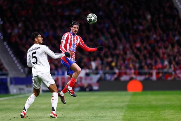 March 12, 2025, Madrid, Madrid, SPAIN: Rodrigo De Paul of Atletico de Madrid and Jude Bellingham of Real Madrid in action during the UEFA Champions League 2024 25 League Round of 16 Second Leg match between Atletico de Madrid and Real Madrid CF, at Riyadh Air Metropolitano stadium on March 12, 2025, in Madrid, Spain. Madrid SPAIN - ZUMAa181 20250312_zaa_a181_109 Copyright: xDennisxAgyemanx