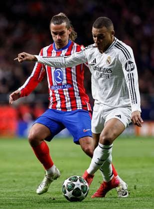 Kylian Mbappà of Real Madrid under pressure Atletico Madrid v Real Madrid, UEFA Champions League, Round of 16, Second Leg, Football, Riyadh Air Metropolitano Stadium, Madrid, Spain - 12 Mar 2025 EDITORIAL USE ONLY No use with unauthorised audio, video, data, fixture lists, club league logos or live services. Online in-match use limited to 120 images, no video emulation. No use in betting, games or single club league player publications. Copyright: xRubenxAlbarran Shutterstockx 15188186ak