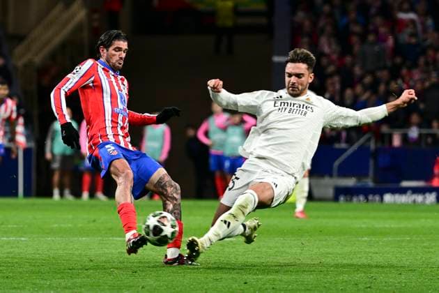 Rodrigo de Paul 5 Atletico Madrid in duel, action, with Raul Asencio 35 Madrid , Atletico Madrid vs Real Madrid , Soccer, Champions League, Round of 16 second leg, 12 03 2025 Madrid Madrid Spain Copyright: xkolbert-press MarcxNiemeyerx