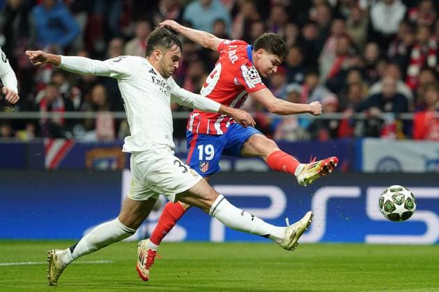 ATLETICO DE MADRID v REAL MADRID CF. CHAMPIONS LEAGUE 2024 2025. ROUND OF 16. 2ND LEG MATCH. Atletico de Madrid s Julian Alvarez (r) and Real Madrid CF s Raul Asencio during Champions League 2024 2025 Round of 16 2nd leg match. March 12,2025. (ALTERPHOTOS Acero) MadridSpain  Copyright: xAcerox