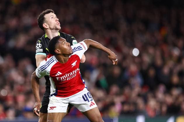 Arsenal gegen PSV Eindhoven 12. März 2025, London UEFA Champions League Achtelfinal-Rückspiel Arsenal gegen PSV Eindhoven Myles Lewis Skelly von Arsenal und Ivan Perisic von PSV Eindhoven Foto Jacques Feeney Offside London UK  Copyright: xJacquesxFeeneyx xOffsidexOffside