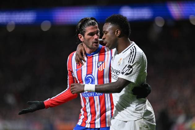 March 12, 2025, Madrid, Madrid, Spain: 7 VINICIUS JR and 5 RODRIGO JAVIER DE PAUL during the UEFA Champions League 2024 25 UEFA Champions League 2024 25 Round of 16 second leg match between Atletico de Madrid and Real Madrid C.F. at Estadio Riyadh Air Metropolitano on March 12, 2025 in Madrid, Spain. Madrid Spain - ZUMAc312 20250312_zsp_c312_064 Copyright: xOscarxManuelxSanchezx
