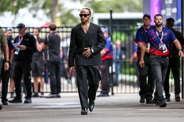 F1 Grand Prix Of Australia - Previews Lewis Hamilton of Great Britain and Scuderia Ferrari arrives at the track during previews ahead of the F1 Grand Prix of Australia at Albert Park Circuit in Melbourne, Australia, on March 13, 2025. Melbourne Victoria Australia  Copyright: xPaddockerx originalFilename:paddocker-f1grandp250313_np9ug.jpg