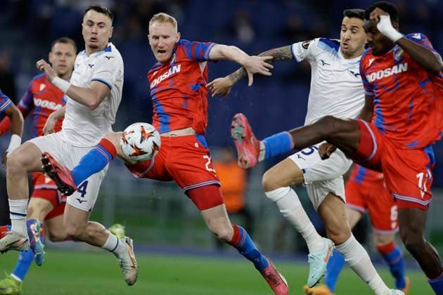 UEFA Europa League Second leg match SS Lazio and Viktoria Plzen Lazio s Spanish defender Patric challenges for the ball with Viktoria Plzen s Czech midfielder Lukas Kalvach during during UEFA Europa League Round of 16 Second leg match between SS Lazio and Viktoria Plzen at Olimpico stadium on March 13, 2025 in Rome, Italy. _BPH9063 Copyright: xAntonioxBalascox