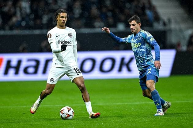 Jean Matteo Bahoya Eintracht Frankfurt, 19 in duel with Lucas Rosa Ajax Amsterdam, 02 , GER, Eintracht Frankfurt vs Ajax Amsterdam football, UEFA Europa League, round of 16, second leg, 2024 25 season, 13 03 2025 GER, Eintracht Frankfurt vs Ajax Amsterdam football, UEFA Europa League, round of 16, second leg, 2024 25 season, 13 03 2025 Frankfurt am Main Copyright: xEibner-Pressefoto FlorianxWieganx EP_FWD