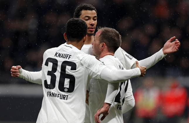 13 03 2025, xovx, Football UEFA Europa League, Eintracht Frankfurt Ajax Amsterdam v l Ansgar Knauff Eintracht Frankfurt , Hugo Ekitike Eintracht Frankfurt and Mario Götze Eintracht Frankfurt celebrate the goal to 2 0 DFL DFB REGULATIONS PROHIBIT ANY USE OF PHOTOGRAPHS as IMAGE SEQUENCES and or QUASI VIDEO emspor Frankfurt am Main