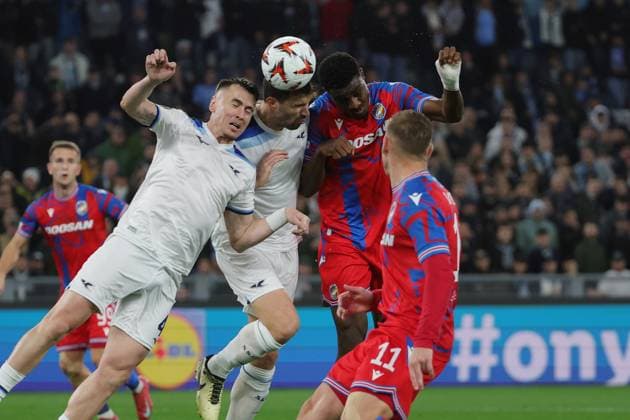 13th March 2025, Stadio Olimpico, Rome, Italy; UEFA Europa League Last 16, Second Leg, Football; Lazio versus Viktoria Plzen; Rafiu Durosinmi of Viktoria Plzen under pressure from Patric and Alessio Romagnoli of SS Lazio  ActionPlus12759670 EmanuelexPennacchio
