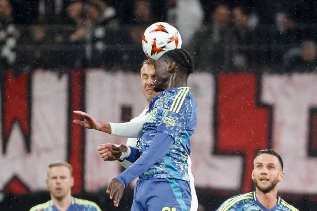 Mario Götze, Gotze Eintracht Frankfurt, 27 and Jorthy Mokio Ajax Amsterdam, 31 in a header duel , Football, UEFA Europa League, Round of 16, 2024 2025, Eintracht Frankfurt vs Ajax Amsterdam, 13 03 2025, Frankfurt Stadion, Frankfurt am Main, Germany Frankfurt am Main Frankfurt Stadion Hessen Germany Copyright: xGrantxHubbsx