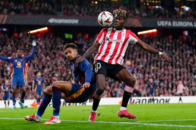 Athletic Club v AS Roma - UEFA Europa League 2024 25 Round of 16 Second Leg Nico Williams left winger of Athletic Club and Spain and Devyne Rensch of Roma compete for the ball during the UEFA Europa League 2024 25 Round of 16 Second Leg match between Athletic Club and AS Roma at Estadio de San Mames on March 13, 2025 in Bilbao, Spain. Bilbao Basque Country Spain  Copyright: xJosexBretonx originalFilename:bretonhernandez-athletic250313_npb3V.jpg