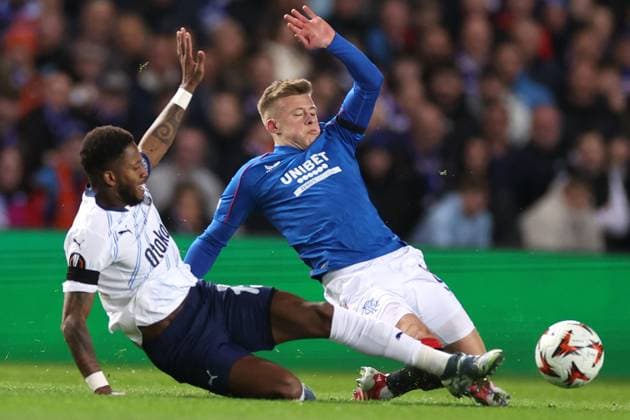 Fred of Fenerbahce tackles Connor Barron of Rangers during the Europa League last 16 match at Ibrox Stadium, Glasgow. Rangers v Fenerbahce, UEFA Europa League, Round of 16, Second Leg, Football, Ibrox Stadium, Glasgow, Scotland, UK - 13 Mar 2025 EDITORIAL USE ONLY No use with unauthorised audio, video, data, fixture lists, club league logos or live services. Online in-match use limited to 120 images, no video emulation. No use in betting, games or single club league player publications. Copyright: xO Rourke RangersxFC Shutterstockx 15196580o