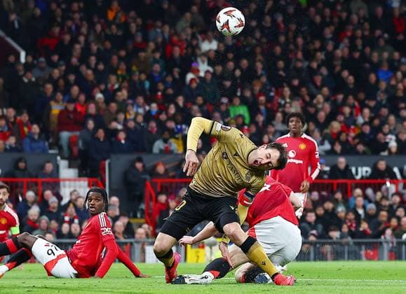 Matthijs de Ligt of Manchester United, ManU brings down Mikel Oyarzabal of Real Sociedad for a penalty kick Manchester United v Real Sociedad, UEFA Europa League, Round of 16, Second Leg, Football, Old Trafford, Manchester, UK - 13 Mar 2025 EDITORIAL USE ONLY No use with unauthorised audio, video, data, fixture lists, club league logos or live services. Online in-match use limited to 120 images, no video emulation. No use in betting, games or single club league player publications. Copyright: xMattxWest Shutterstockx 15188208j