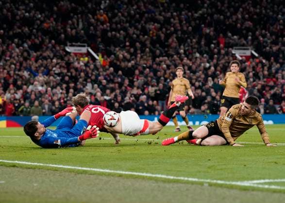 Manchester, England, 13th March 2025. Rasmus Hojlund of Manchester United, ManU is brought down to earn a penalty during the UEFA Europa League match Manchester United v Real Sociedad at Old Trafford, Manchester. Picture credit should read: Andrew Yates Sportimage EDITORIAL USE ONLY. No use with unauthorised audio, video, data, fixture lists, club league logos or live services. Online in-match use limited to 120 images, no video emulation. No use in betting, games or single club league player publications. SPI_024_AY_MANU_SOCIEDAD SPI-3744-0024