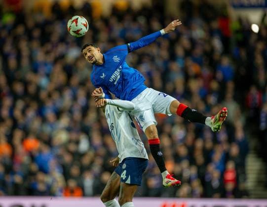 13th March 2025; Ibrox Stadium, Glasgow, Scotland; UEFA Europa League Last 16 Second Leg Football, Rangers versus Fenerbahce; Jefte of Rangers beats Anderson Talisca of Fenerbahce to the ball in the air  ActionPlus12759898 VagelisxGeorgariou
