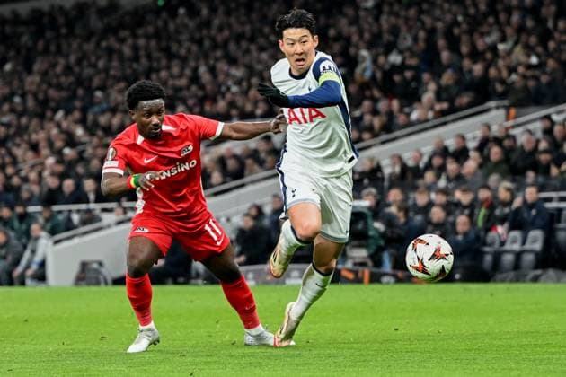 Tottenham Hotspur v AZ Alkmaar Europa League 13 03 2025. Tottenham Hotspur forward Son Heung-Min (7) takes on AZ Alkmaar forward Ernest Poku (21) during the Europa League match between Tottenham Hotspur and AZ Alkmaar at Tottenham Hotspur Stadium, London, United Kingdom on 13 March 2025. London Tottenham Hotspur Stadium London United Kingdom Editorial use only , Copyright: xSimonxTraylenx PSI-21627-0037