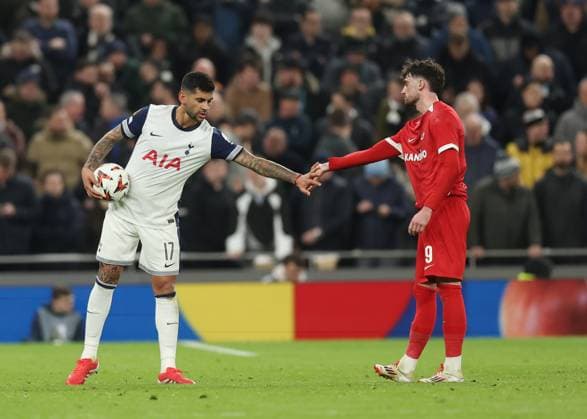London, England, 13th March 2025. Cristian Romero of Tottenham makes peace with Troy Parrott of AZ Alkmaar during the UEFA Europa League match Tottenham Hotspur v AZ Alkmaar at the Tottenham Hotspur Stadium, London. Picture credit should read: David Klein Sportimage EDITORIAL USE ONLY. No use with unauthorised audio, video, data, fixture lists, club league logos or live services. Online in-match use limited to 120 images, no video emulation. No use in betting, games or single club league player publications. SPI_025_DK_Tottenham_Alkmaar SPI-3742-0025