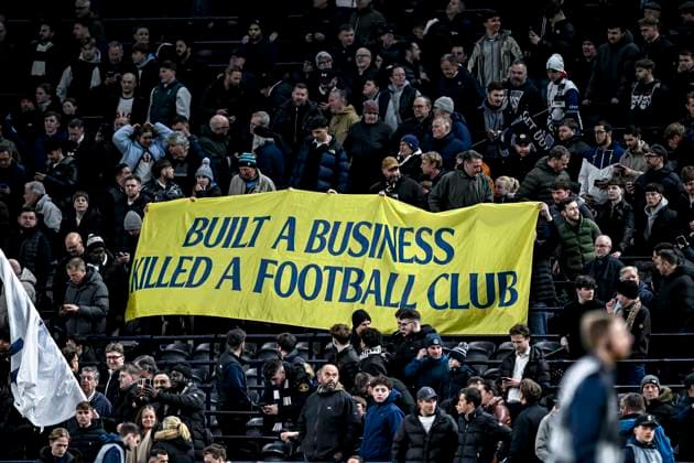 Fans of Tottenham Hotspur with a banner against modern football, during the match Tottenham Hotspur AZ at the Tottenham Hotspur Stadium for the UEFA Europa League Round of 16 2nd Leg season 2024 2025 in LONDON, Great Britain on 13 march 2025, photo by Stefan Koops EYE4images DeFodi Images