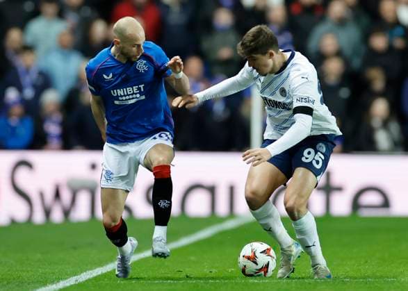 Rangers v Fenerbahce S.K. UEFA Europa League Yusuf Akcicek of Fenerbahce S.K. (right) competes for the ball with Vaclav ÄaernÃ½ of Rangers during the UEFA Europa League Round of 16 Second Leg match at Ibrox Stadium, Glasgow UK Newspapers OUT Copyright: xFredxPalmerx FIL-21575-0068