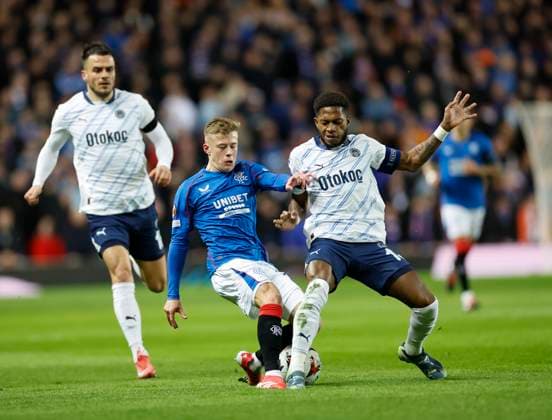 Rangers v Fenerbahce S.K. UEFA Europa League Connor Barron of Rangers competes for the ball with Fred of Fenerbahe S.K. during the UEFA Europa League Round of 16 Second Leg match at Ibrox Stadium, Glasgow UK Newspapers OUT Copyright: xFredxPalmerx FIL-21575-0076
