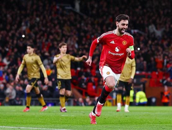 Bruno Fernandes of Manchester United, ManU celebrates scoring a goal from the penalty spot to make it 2-1 Manchester United v Real Sociedad, UEFA Europa League, Round of 16, Second Leg, Football, Old Trafford, Manchester, UK - 13 Mar 2025 EDITORIAL USE ONLY No use with unauthorised audio, video, data, fixture lists, club league logos or live services. Online in-match use limited to 120 images, no video emulation. No use in betting, games or single club league player publications. Copyright: xMattxWest Shutterstockx 15188208ae