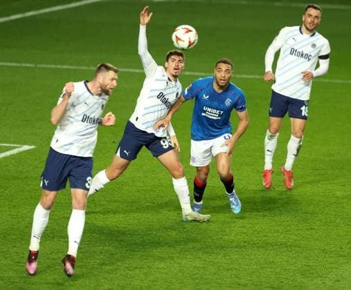 Cyriel Dessers of Rangers in action with Milan Skriniar, Yusuf Akcicek and Filip Kostic of Fenerbahce during the UEFA Europa League round of 16 match at Ibrox Stadium, Glasgow. Rangers v Fenerbahce, UEFA Europa League, Round of 16, Second Leg, Football, Ibrox Stadium, Glasgow, Scotland, UK - 13 Mar 2025 EDITORIAL USE ONLY No use with unauthorised audio, video, data, fixture lists, club league logos or live services. Online in-match use limited to 120 images, no video emulation. No use in betting, games or single club league player publications. Copyright: xRangersxFC Shutterstockx 15196581e