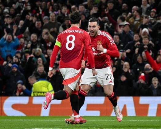 UEFA Europa League Last 16 Manchester United, ManU v Real Sociedad Bruno Fernandes of Manchester United celebrates his goal to make it 2-1 with Diogo Dalot of Manchester United during the UEFA Europa League Last 16 match Manchester United vs Real Sociedad at Old Trafford, Manchester, United Kingdom, 13th March 2025 (Photo by Craig Thomas News Images) Manchester Old Trafford Greater Manchester United Kingdom Copyright: xCraigxThomas NewsxImagesx