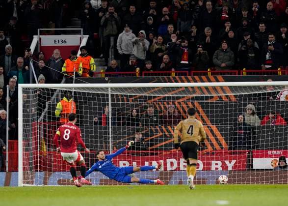 Manchester, England, 13th March 2025. Bruno Fernandes of Manchester United, ManU scores his second penalty of the night past Rome-Jayden Owusu-Oduro of AZ Alkmaar during the UEFA Europa League match Manchester United v Real Sociedad at Old Trafford, Manchester. Picture credit should read: Andrew Yates Sportimage EDITORIAL USE ONLY. No use with unauthorised audio, video, data, fixture lists, club league logos or live services. Online in-match use limited to 120 images, no video emulation. No use in betting, games or single club league player publications. SPI_057_AY_MANU_SOCIEDAD SPI-3744-0060